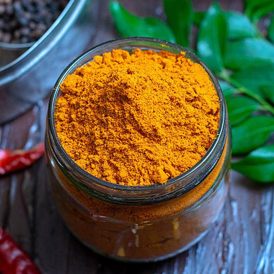 a close up of a bowl of food on a table