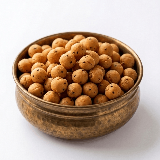 Kaihunnyam Cheedai snack in 200g pack, crispy Indian-style savory snacks with spiced, crunchy dough balls on a white background