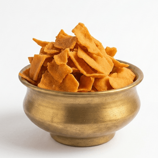 Kaupunnyam Ribbon Pokodam snack in a 200g package, crispy Indian snack with colorful ribbon-shaped pieces on a white background.