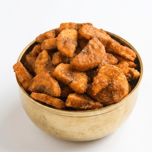 Sarkara Varatti (Jaggery Banana Chips) by Kaipunnyam in a 200g pack, featuring golden banana chips coated with jaggery.