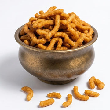 Kaimunnyam Manoharam snack package, 200g, traditional Indian savory snacks with crispy, golden-brown appearance