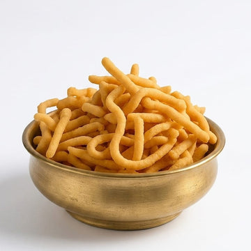 Kaimunnyam Thenkuzhal snack in 200g pack, crispy Indian savory snack made from rice flour and spices, traditional snack from South India