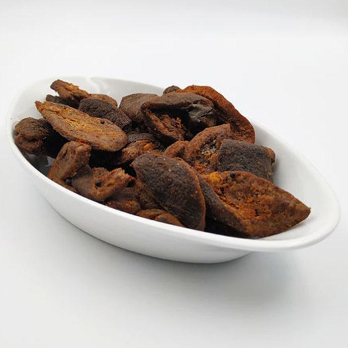 a close up of a bowl of food on a table 