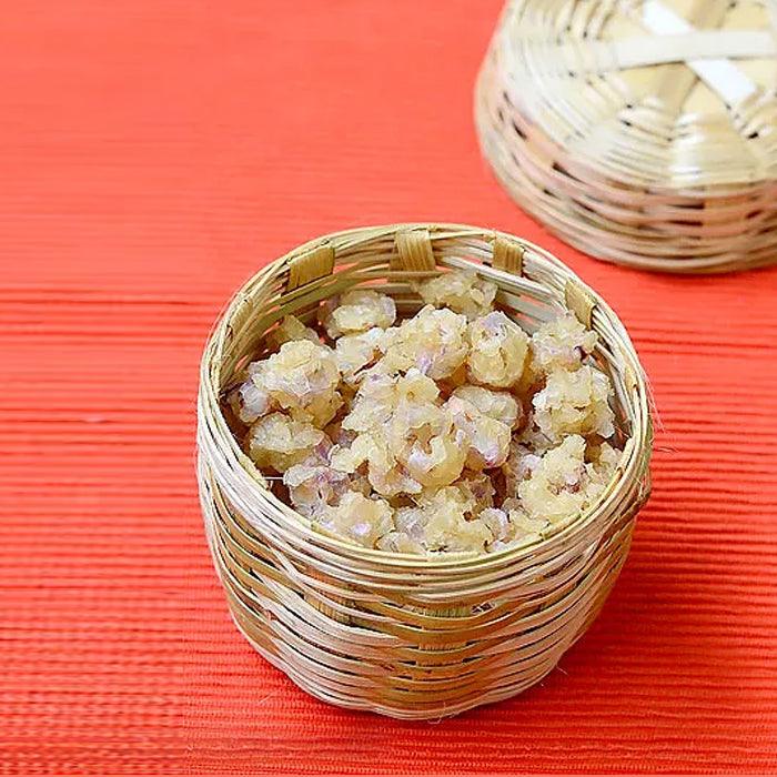 a close up of a bowl of food on a table 