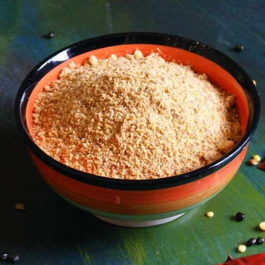 a bowl of food is sitting on a table 